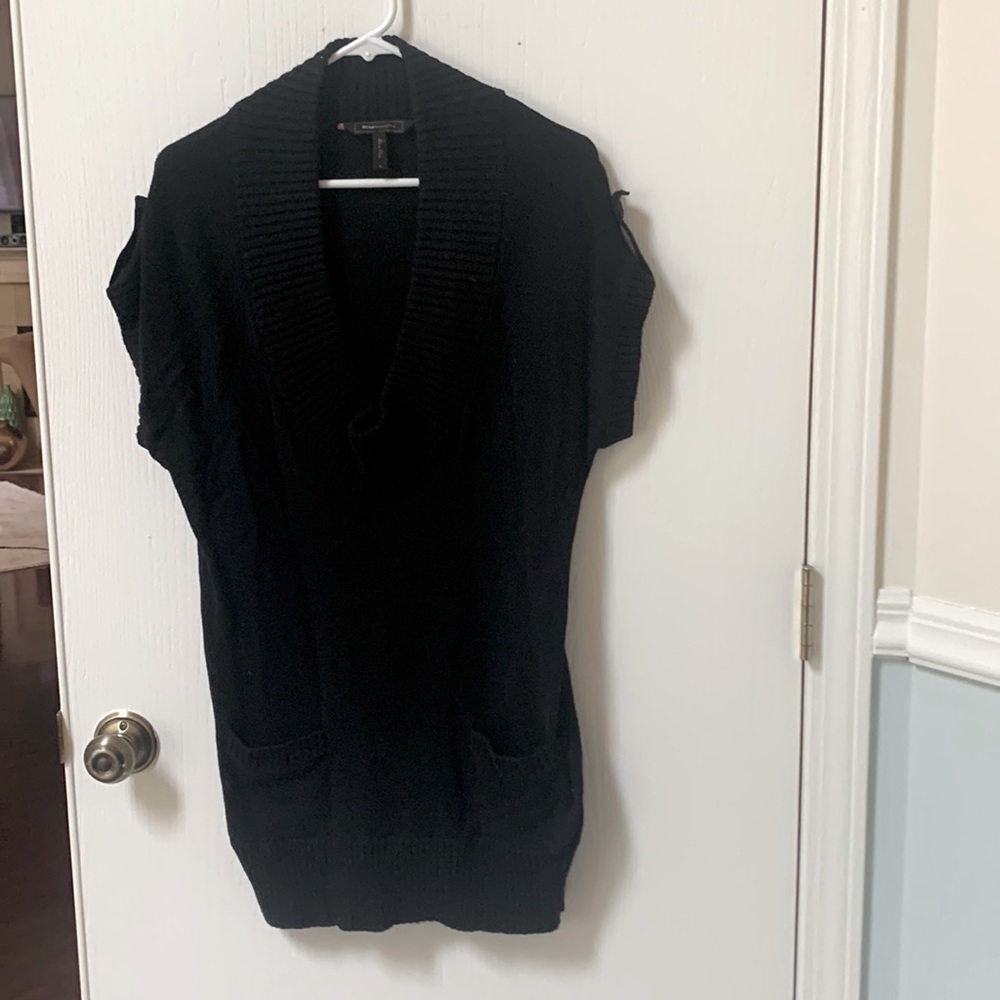 Long black short sleeve sweater by BCBG MAX AZRIA. Size small
